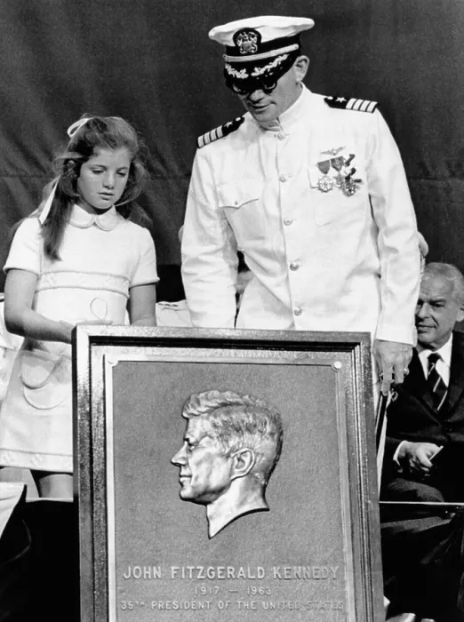 Framed Print : Caroline Kennedy with Capt. Earl Yates, commander of the newly commissioned aircraft carrier, USS John F. Kennedy Framed Print : Caroline Kennedy with Capt. Earl Yates, commander of the newly commissioned aircraft carrier, USS John F. Kennedy
