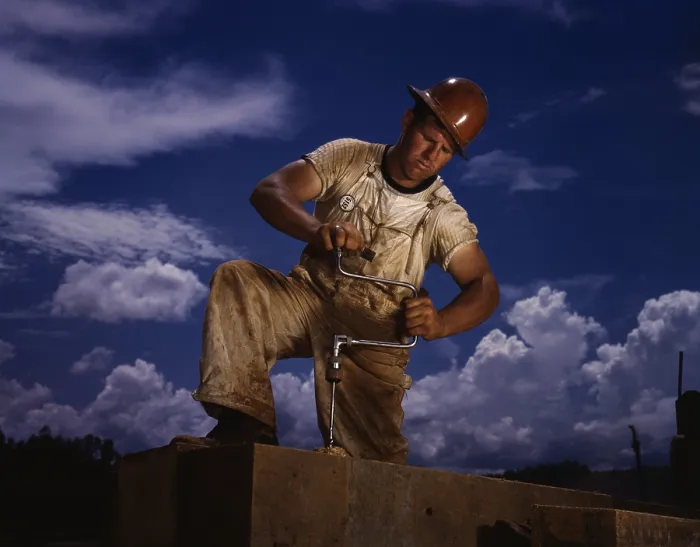 Framed Print : A carpenter working at the Tennessee Valley Authority's Douglas dam on the French Broad River. June 1942