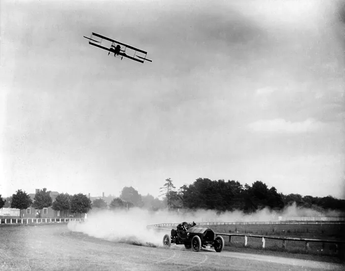 Framed Print : Cars. Race between Lincoln Beechey in airplane and Barney Oldfield in automobile, going around race track, June, 28 1912