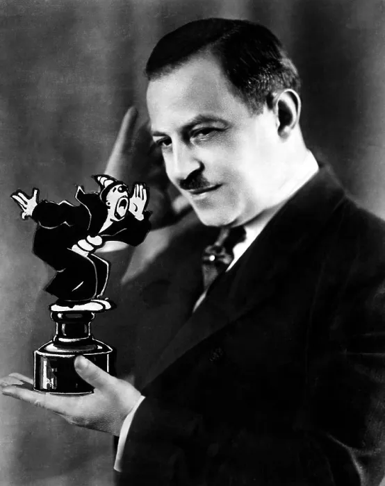 Framed Print : Cartoonist Max Fleisher holding a statue of Koko the Clown. 1920s. Courtesy CSU Archives / Everett Collection