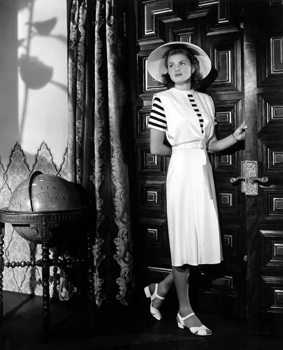 Framed Print : CASABLANCA, Ingrid Bergman wearing a jumper dress designed by Orry-Kelly, 1942 Framed Print : CASABLANCA, Ingrid Bergman wearing a jumper dress designed by Orry-Kelly, 1942