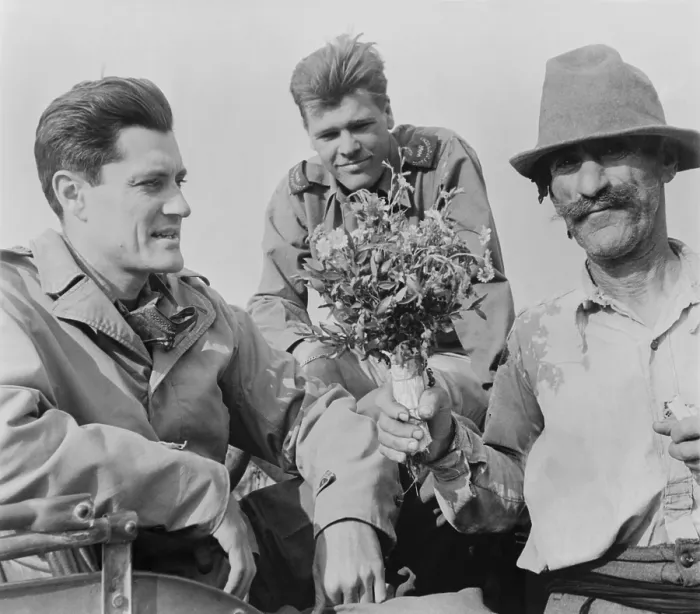 Framed Print : CBS News correspondent Eric Sevareid reporting from Italy during World War 2. He receives flowers from Italian peasant on June 20, 1944 Framed Print : CBS News correspondent Eric Sevareid reporting from Italy during World War 2. He receives flowers from Italian peasant on June 20, 1944