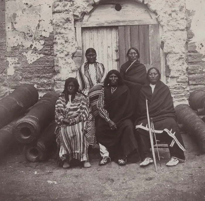 Framed Print : Some of the most celebrated Indian chiefs and the two women confined in the old Spanish fort as prisoners of war. Seated, L-R: Mrs. Black Horse, Black Horse, Menimic