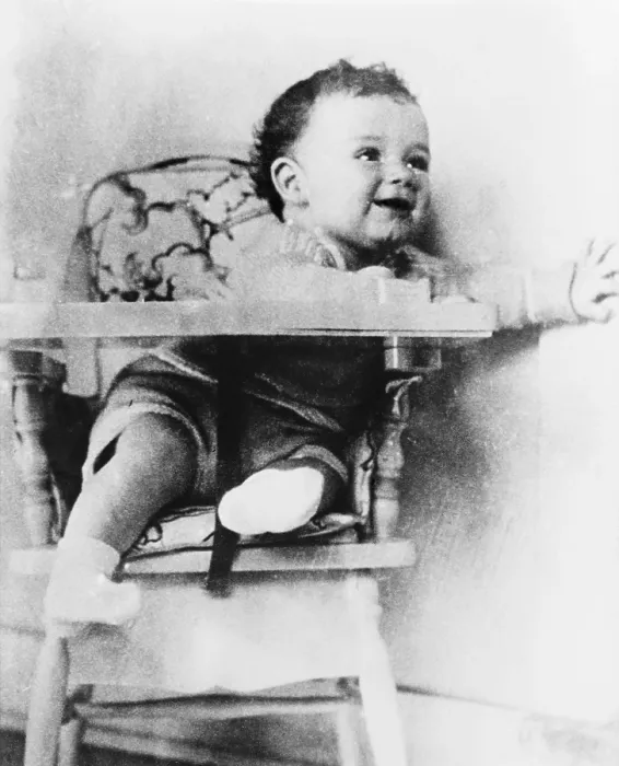 Framed Print : Charles A. Lindbergh Jr. son of the celebrated aviator, in highchair