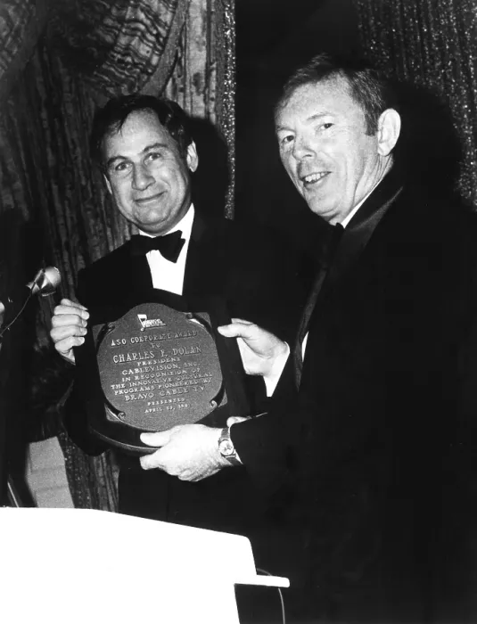 Framed Print : Charles F. Dolan (right) accept award for Bravo cable company's innovative accomplishments from Joel Berson of the American Symphony Orchesra, 1981 Framed Print : Charles F. Dolan (right) accept award for Bravo cable company's innovative accomplishments from Joel Berson of the American Symphony Orchesra, 1981