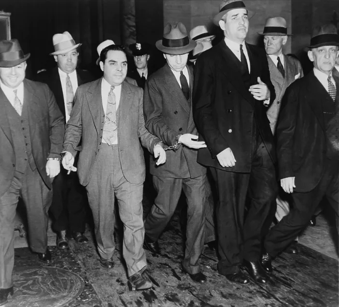 Framed Print : Charles Lucky Luciano (in center with head down), handcuffed to two deputies