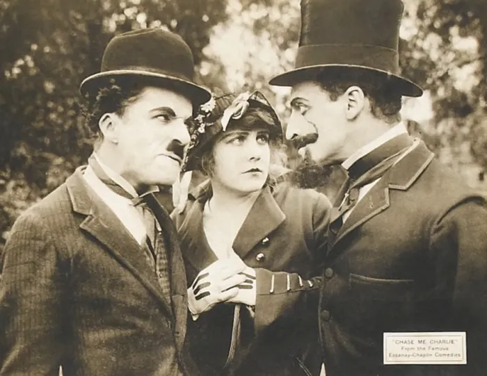Framed Print : CHASE ME CHARLIE, left: Charlie Chaplin on lobbycard, 1918 Framed Print : CHASE ME CHARLIE, left: Charlie Chaplin on lobbycard, 1918