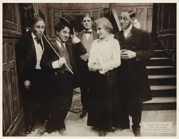 Framed Print : CHASE ME CHARLIE, US lobbyard, second from left: Charlie Chaplin 1918