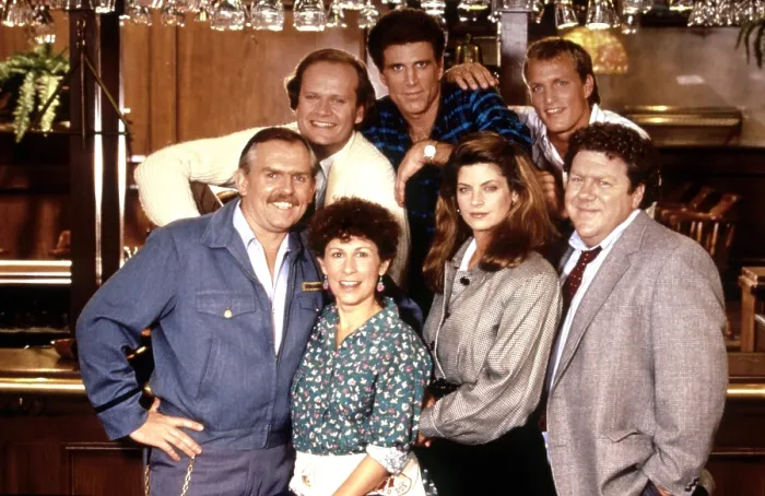 Framed Print : CHEERS, clockwise from left, John Ratzenberger, Kelsey Grammer, Ted Danson, Woody Harrelson, George Wendt, Kirstie Alley, Rhea Perlman, 1982-93 (1987 photo)