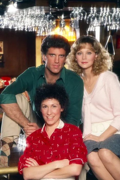 Framed Print : CHEERS, from left: Rhea Perlman (front), Ted Danson, Shelley Long, 1983, (1982-1993)