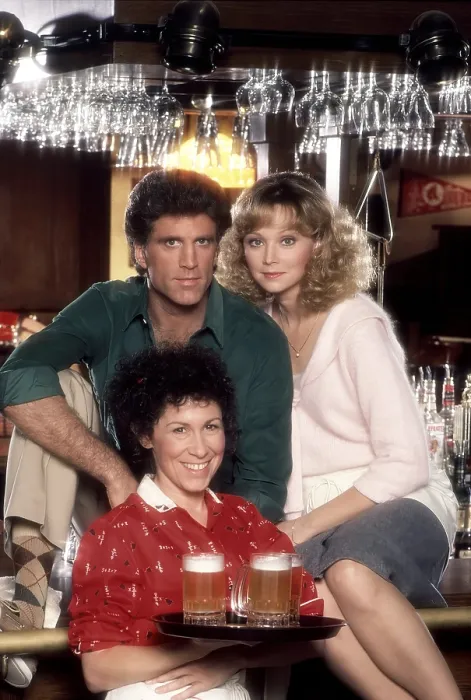 Framed Print : CHEERS, from left: Rhea Perlman (front), Ted Danson, Shelley Long, 1983, (1982-1993)