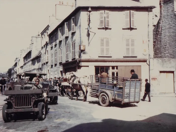 Framed Print : Cherbourg street traffic after liberation from German occupation. Local civilian and military vehicles crowd the Place de la Republique. June 27-30, 1944 Framed Print : Cherbourg street traffic after liberation from German occupation. Local civilian and military vehicles crowd the Place de la Republique. June 27-30, 1944