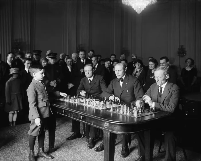 Framed Print : Chess prodigy, Samuel Herman Reshevsky, in a simultaneous chess exhibition match, April 6, 1922. The 10 year old was on an U.S