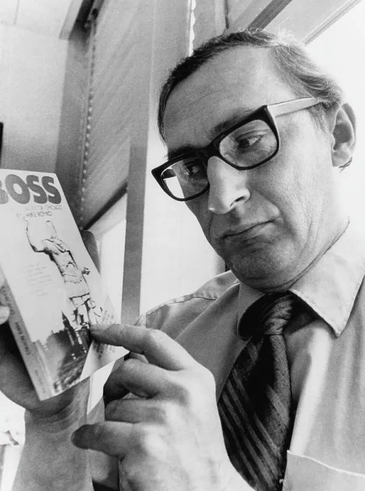 Framed Print : Chicago Daily News columnist Mike Royko, (1932-1997), with a copy of his book Boss, 1971.. Courtesy: CSU Archives  /  Everett Collection