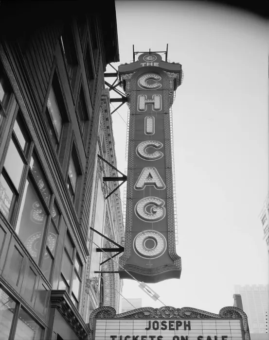 Framed Print : The Chicago Theater, constructed in 1921, photograph shows the sign and the Page Brothers building to the right, 175 North State Street, Chicago, Illinois, circa 1990s