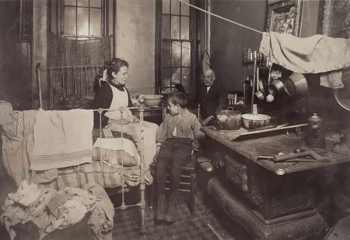 Framed Print : Child abuse, from caption: Jimmie Chinquanana, 11 Hamilton Street, In dark, inner room of his home, in the rear of their store. He is the ninth child, six of whom are dead