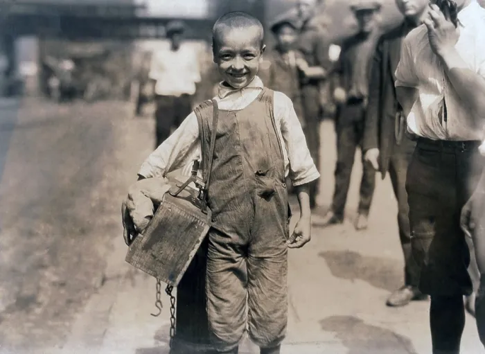 Framed Print : Child labor, Bootblack near Trinity Church, New York City. photograph by Lewis Wickes Hine, July, 1924