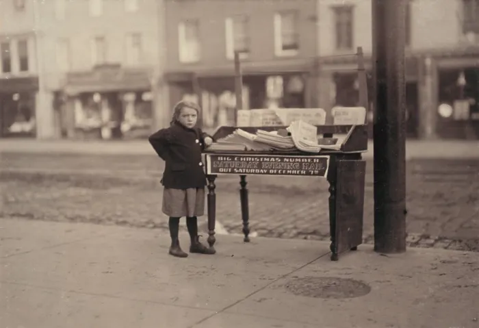 Framed Print : Child labor, Little girl, apparently 6 years old, but didn't know her name or age, tending stand at Washington and 3rd Street, for older sister, saloon on corner, Hoboken