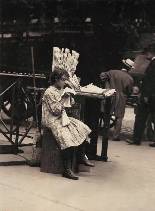 Framed Print : Child labor, Minnie Paster, 10 years old, tending news stand at Bowery and Bond street, New York, photograph by Lewis Wickes Hine, July, 1910