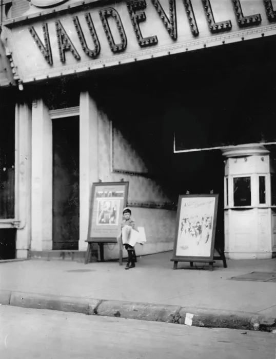 Framed Print : Child labor in front of a movie theater