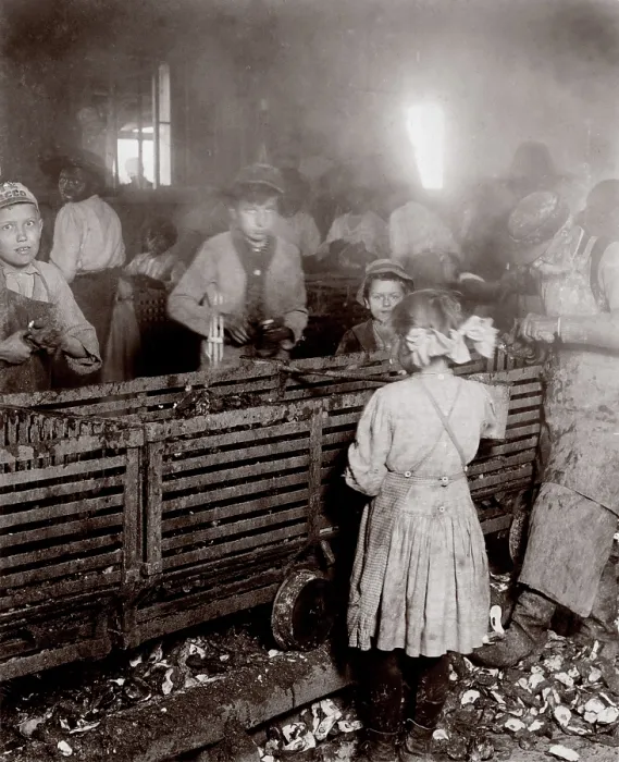 Framed Print : Child labor, scene in a canning factory, from original caption: showing a 7-year old girl who shucks 3 pots of oysters a day, and works regularly