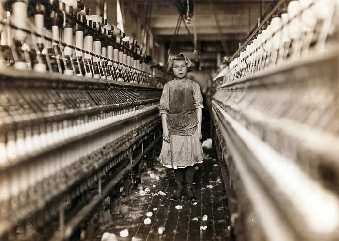 Framed Print : Child laborer portrayed by Lewis Hine in 1909. Little spinner who regularly worked in cotton mill in Augusta, Georgia