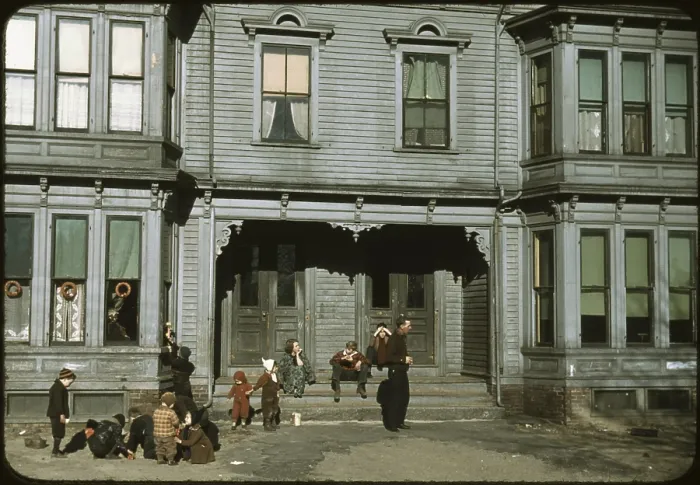 Framed Print : Children with adult in the tenement district, Brockton, Massachusetts, photograph by Jack Delano, December, 1944