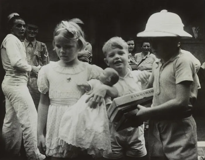 Framed Print : Children clutching their toys as they evacuate from Singapore before the arrival of the Japanese. Ca. Feb. 1942. World War 2. (BSLOC_2014_10_143) Framed Print : Children clutching their toys as they evacuate from Singapore before the arrival of the Japanese. Ca. Feb. 1942. World War 2. (BSLOC_2014_10_143)