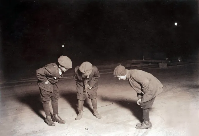 Framed Print : Children playing a dice game, from original caption: A midnight crap game in the street near Post Office, Providence, R.I. Nov 23, 1912. One 12 years old, one 14