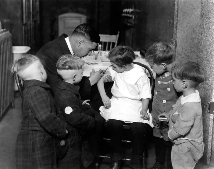 Framed Print : Children receiving vaccinations by Dr. John Davies, 1930's.. Courtesy: CSU Archives / Everett Collection Framed Print : Children receiving vaccinations by Dr. John Davies, 1930's.. Courtesy: CSU Archives / Everett Collection