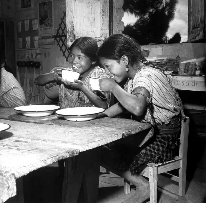 Framed Print : Children from a rural school nesar Lake Atitlan, in Guatemala, are shown enjoying their daily ration of milk, supplied by UNICEF. 1953