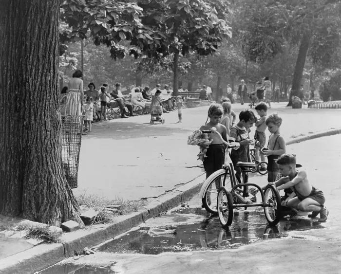 Framed Print : Children with tricycles play near a puddle in Washington Square Park. New York City Aug. 3, 1948. (BSLOC_2014_13_167)