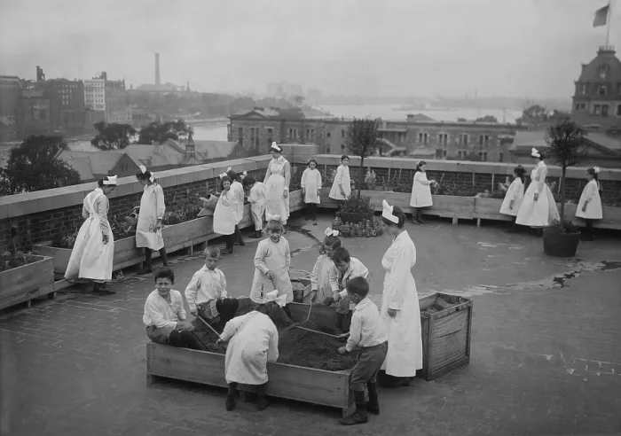 Framed Print : Children's roof garden at Ellis Island offered relief from boredom for young detainees, c.1910s. They were held back from U.S. entry because a parent was quarantined