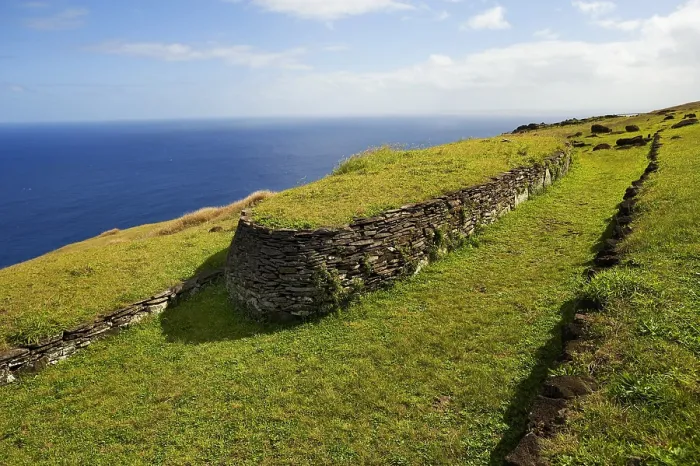 Framed Print : CHILE. VALPARAISO. Ahu Tongariki. Easter Island. Rapa Nui National Park. South coast. Slopes of Rano Kao vulcano. Sacred site. House of the ceremonial village Orongo