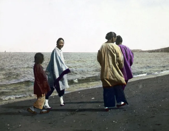 Framed Print : China, four women walking along the seashore, hand colored lantern slide, photograph by William Henry Jackson, 1895