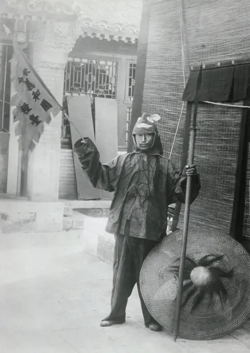 Framed Print : Chinese Boxer with shield and banner on urban street, c. 1900. The Boxers, were called by the Chinese, Ih-hwo-Ch'uan, or Fists of Righteous Harmony Framed Print : Chinese Boxer with shield and banner on urban street, c. 1900. The Boxers, were called by the Chinese, Ih-hwo-Ch'uan, or Fists of Righteous Harmony