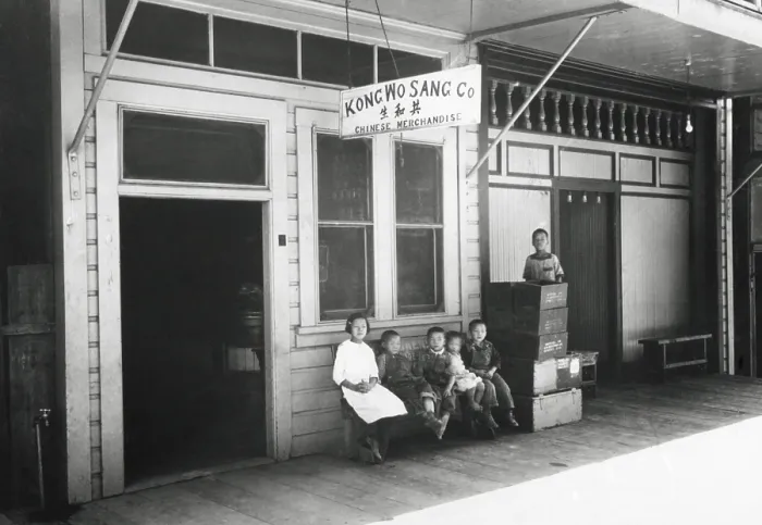 Framed Print : Six Chinese children sit outside the Kong Wo Sang Company in 1926. They are in Newcastle, California, now a small town about 20 miles northwest of Sacramento