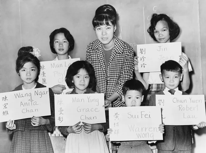 Framed Print : Six Chinese children who recently arrivaled from Hong Kong and Formosa, hold placards giving their Chinese name in both Chinese ideographs and transliteration