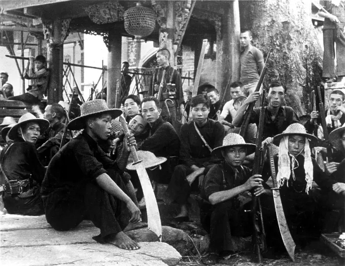 Framed Print : Chinese guerillas, who are fighting against the Japanese, armed with big swords as well as rifles, rest near Canton Framed Print : Chinese guerillas, who are fighting against the Japanese, armed with big swords as well as rifles, rest near Canton