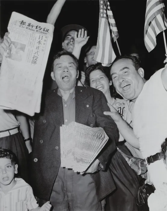 Framed Print : Chinese newspaper vendor, among crowd waving American flags in Chinatown, New York, on V-J Day Framed Print : Chinese newspaper vendor, among crowd waving American flags in Chinatown, New York, on V-J Day