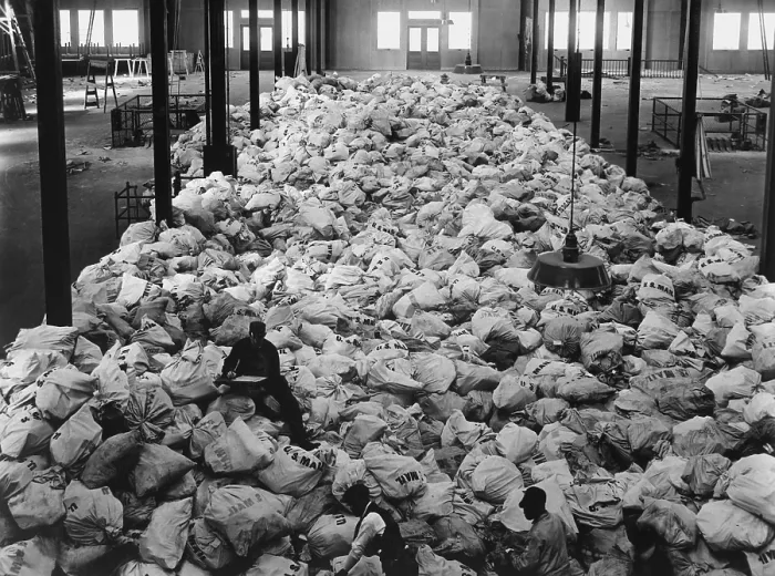 Framed Print : Christmas mail for American World War I soldiers being sorted at Pier 86, in New York City. The mail comes from every part of the country. Nov. 20, 1918