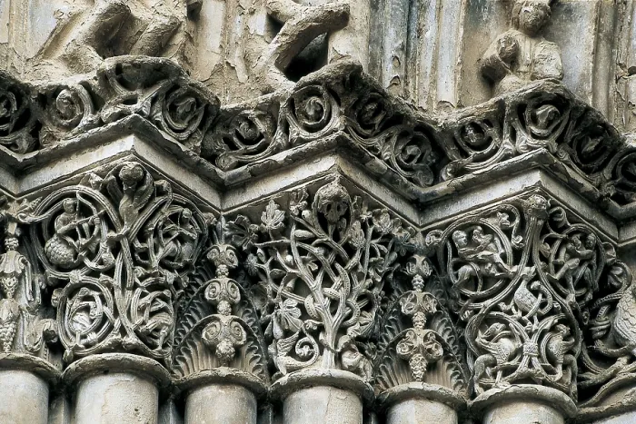 Framed Print : Church of Santa Mara in Agramunt. 13th c. SPAIN. Agramunt. Church of St. Mary. Capitals of the columns at the main gate. Romanesque art. Relief on marble