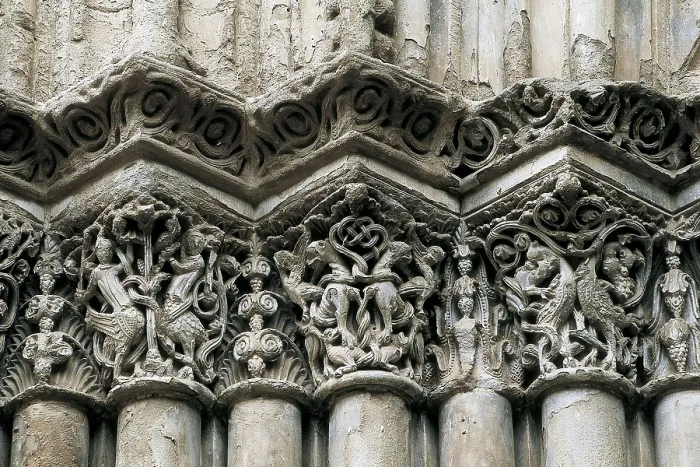 Framed Print : Church of Santa Mara in Agramunt. 13th c. SPAIN. Agramunt. Church of St. Mary. Capitals of the columns at the main gate. Romanesque art. Relief on marble