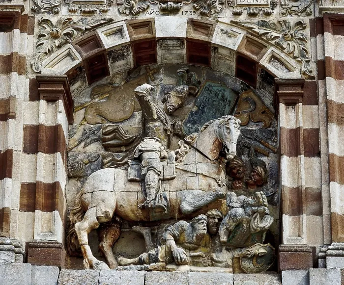 Framed Print : CID, Rodrigo Daz de Vivar, called The (1043-1099). Front door of the monastery depicting The Cid on his horse Babieca fighting against the Sarracens. Relief on rock. SPAIN