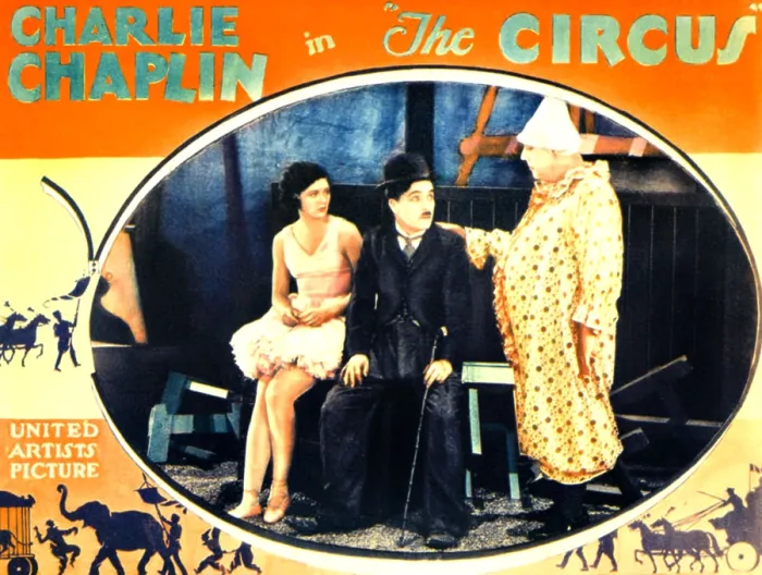 Framed Print : THE CIRCUS, l-r: Merna Kennedy, Charlie Chaplin, Henry Bergman on lobbycard, 1928