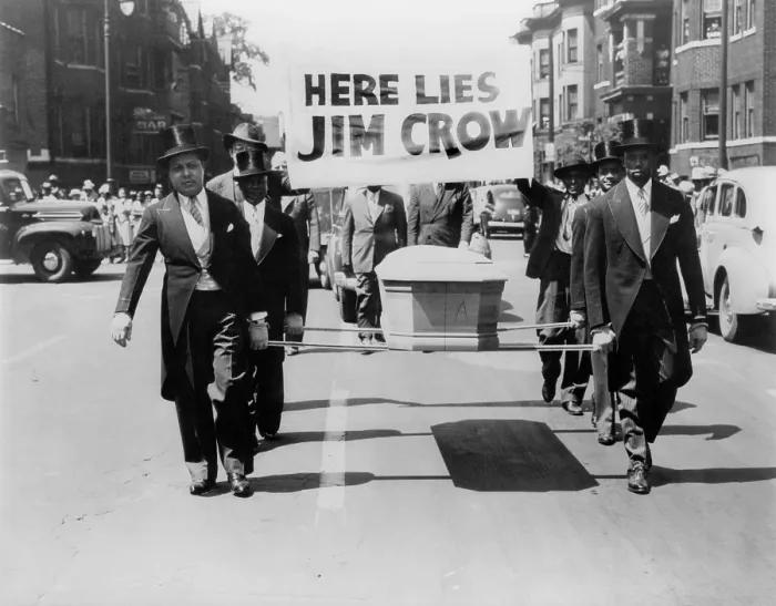 Framed Print : Civil rights demonstration in a NAACP Detroit branch PARADE FOR VICTORY, 1944. Six African American men in top haps and tails, carry a coffin with the sign, HERE LIES JIM CROW Framed Print : Civil rights demonstration in a NAACP Detroit branch PARADE FOR VICTORY, 1944. Six African American men in top haps and tails, carry a coffin with the sign, HERE LIES JIM CROW