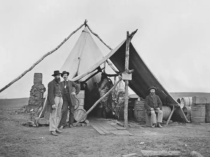 Framed Print : US Civil War, 1861-1865. Dressed beef hangs in a Union Army tent before distribution to the encamped soldiers. Photo by Mathew Brady (BSLOC_2018_8_175)