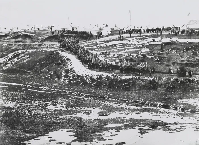 Framed Print : US Civil War, 1861-65. Union troops drilling on partially snow covered road up a hill, near Washington, DC. The camp's tents are on the top of the hill (BSLOC_2018_8_160)