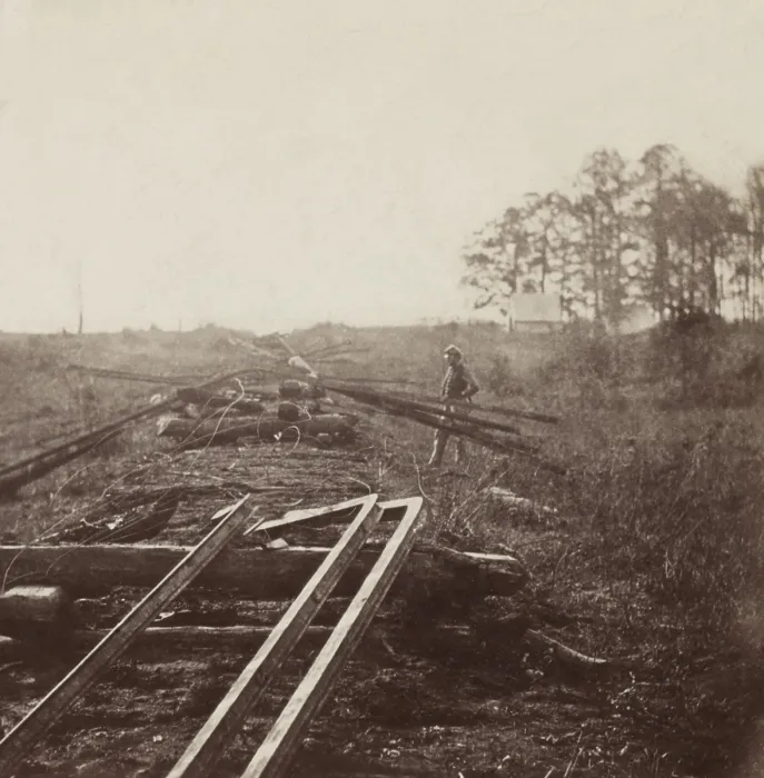 Framed Print : US Civil War. Atlanta, Georgia, Oct. 1864. Union soldier inspecting the destruction of Confederate railroad tracks and telegraph lines