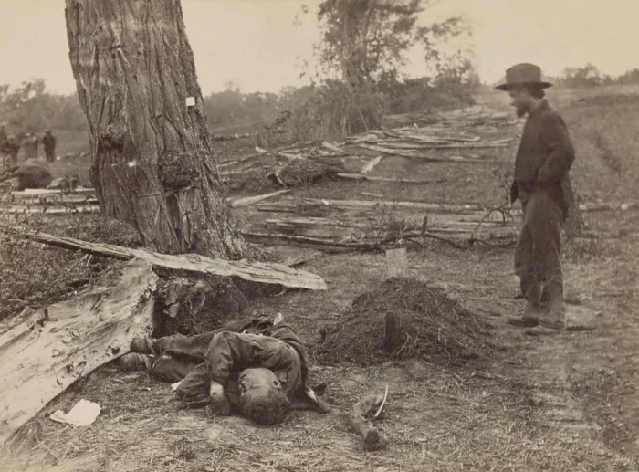 Framed Print : US Civil War. Battle of Antietam, also called Battle of Sharpsburg, Sept. 17, 1862. A man stands at the grave of 1st Lt. John A. Clark, Company D, of the 7th Michigan Infantry